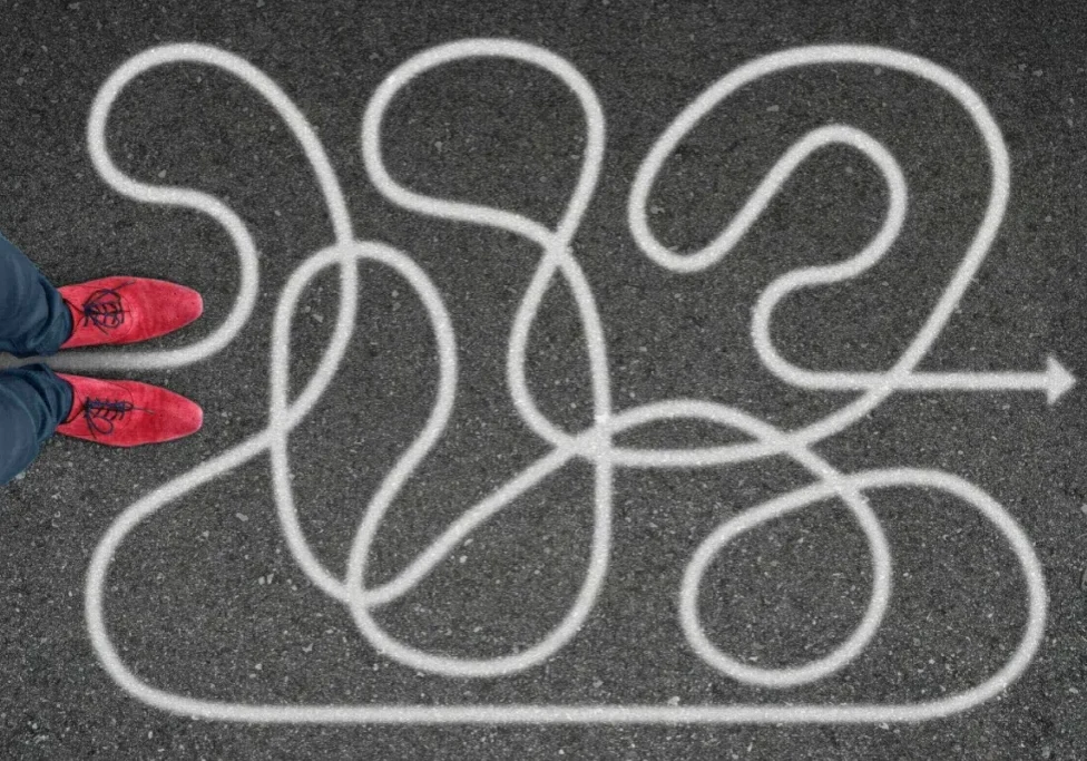 Red shoes on path shaped like "2023".